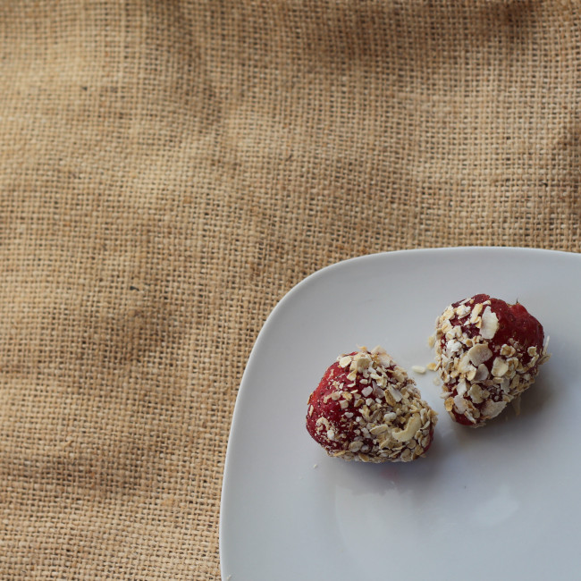 Carefree honey dipped strawberries in toasted coconut and oats.